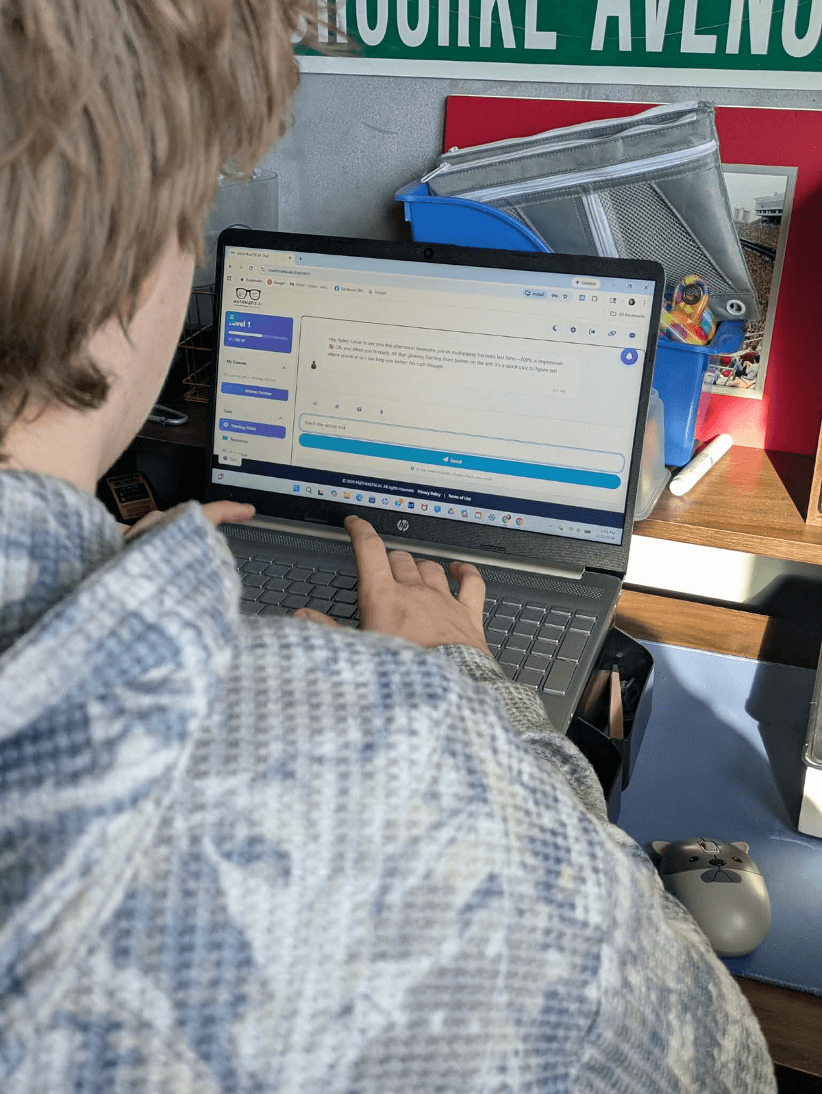 Student working independently on math with Mathmatix AI at his desk