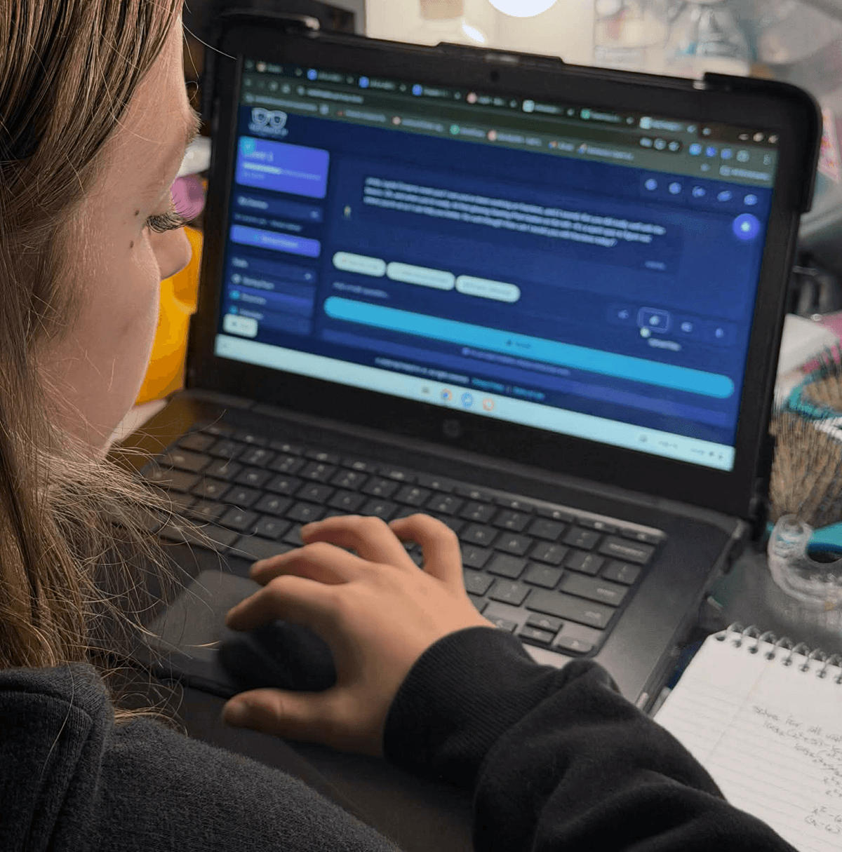 Student using Mathmatix AI on her laptop