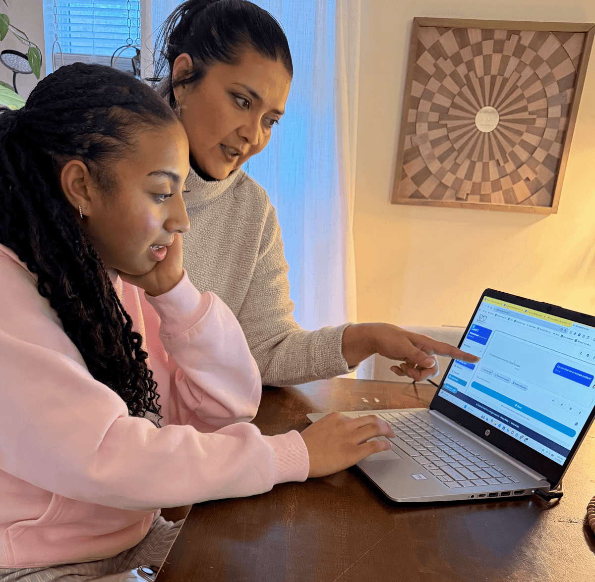Mother helping her daughter learn math with Mathmatix AI